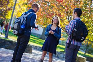 Three students chatting